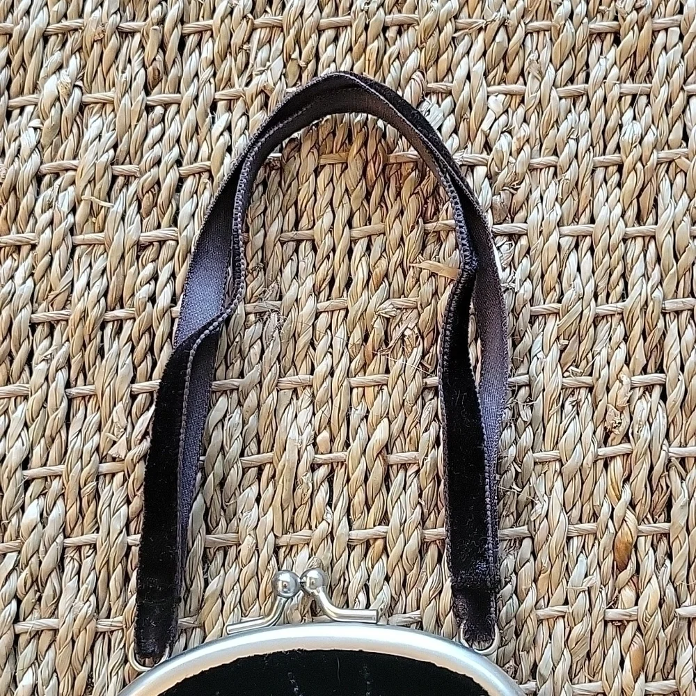 LITTLE black velvet purse with velvet straps and beads.  Tag says gymboree.